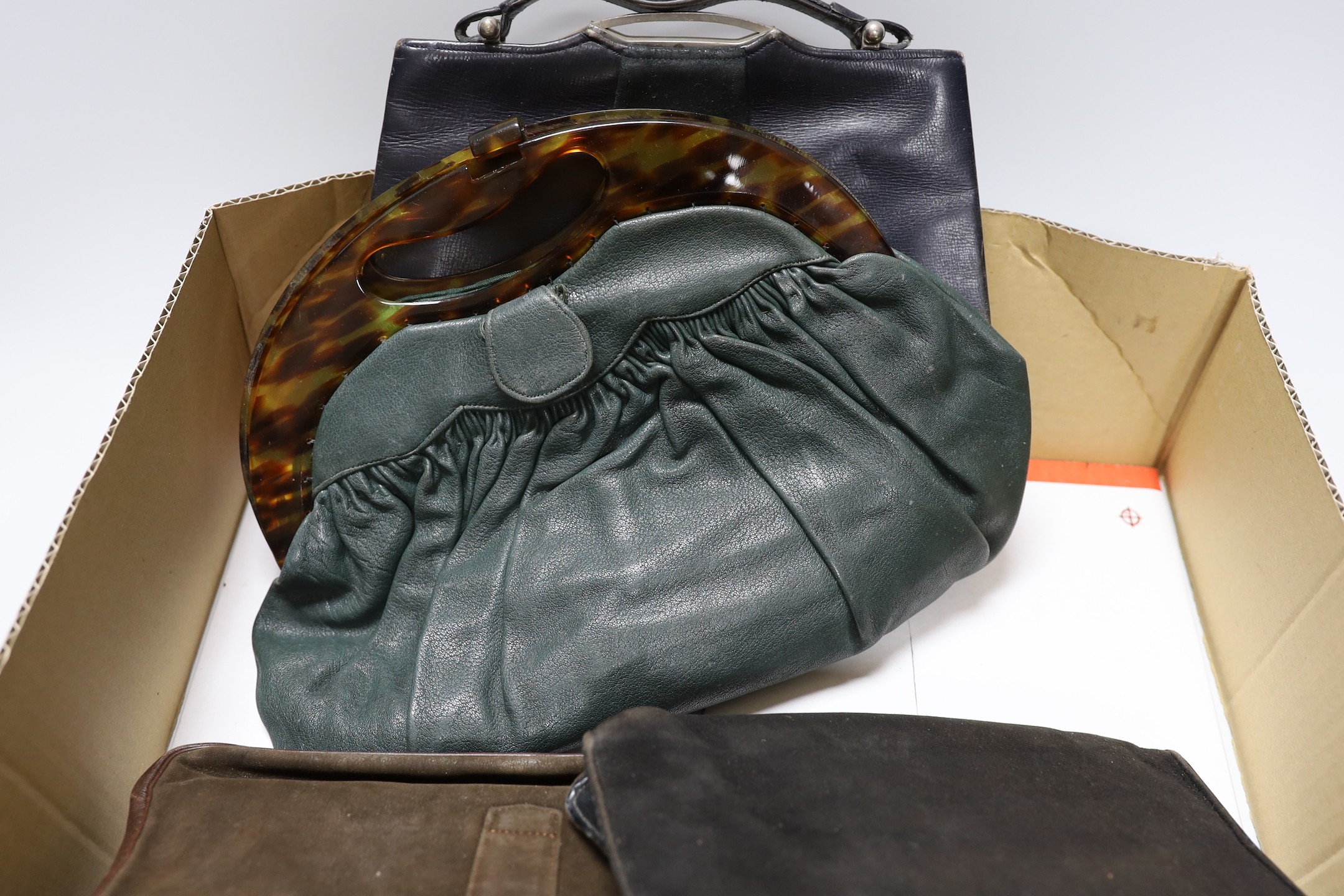A collection of nine 1930's and 1940's leather, suede and crocodile ladies handbags with unusual metal clasps and frames